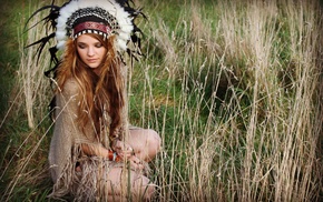 crouching, blonde, headdress, looking down, spikelets, grass
